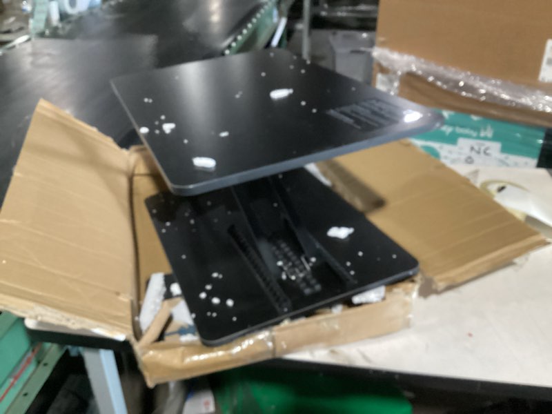 Condition photo showing New/Like New for yoopin standing desk converter, 25.16" × 15.75" height adjustable laptop stand for desk, sit stand monitor stand, no assembly required for home and office use (black)
