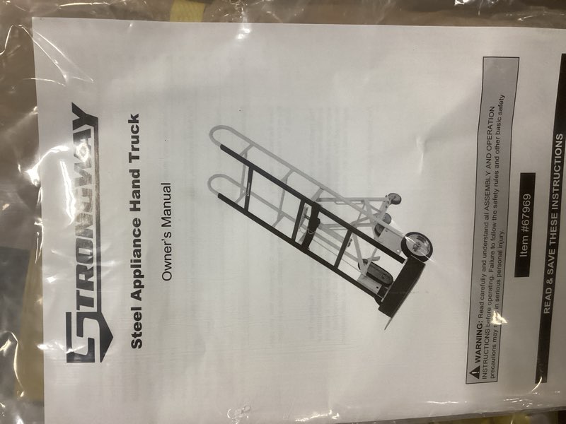 Condition photo showing As Is for Strongway Industrial Appliance Hand Truck 1200-Lb. Capacity, 2 or 4 Wheel Position, Rubber Coated Steel Frame
