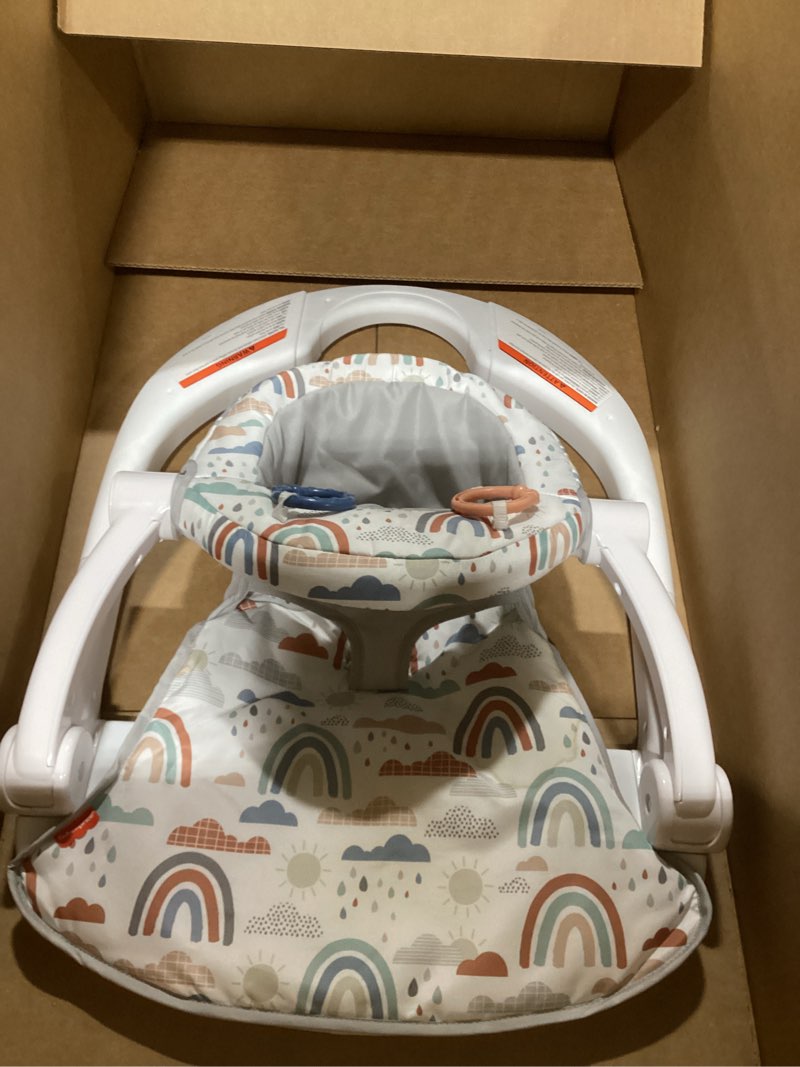 Condition photo showing As Is for Fisher-Price Portable Baby Chair Sit-Me-Up Floor Seat with Developmental Toys & Machine Washable Seat Pad, Rainbow Showers One Size Rainbow Showers
