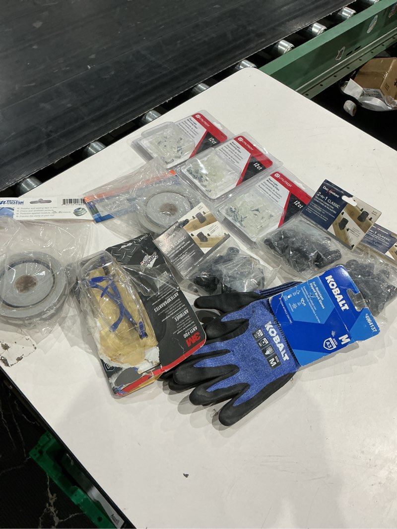 Condition photo showing As Is for assorted home improvement lot (small tools, screw, home accessories, etc.)