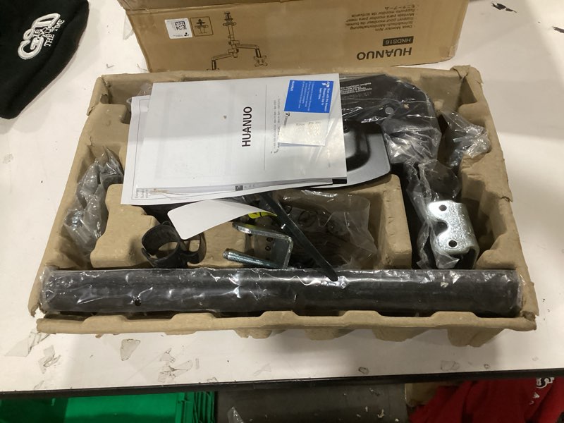 Condition photo showing As Is for HUANUO Dual Monitor Mount up to 32 inches Screens, Taller Monitor Stand Hold 19.8lbs, Dual Monitor Arm Desk Mount Easy Adjustable with Tilt, Swivel, Rotation, VESA 75/100mm