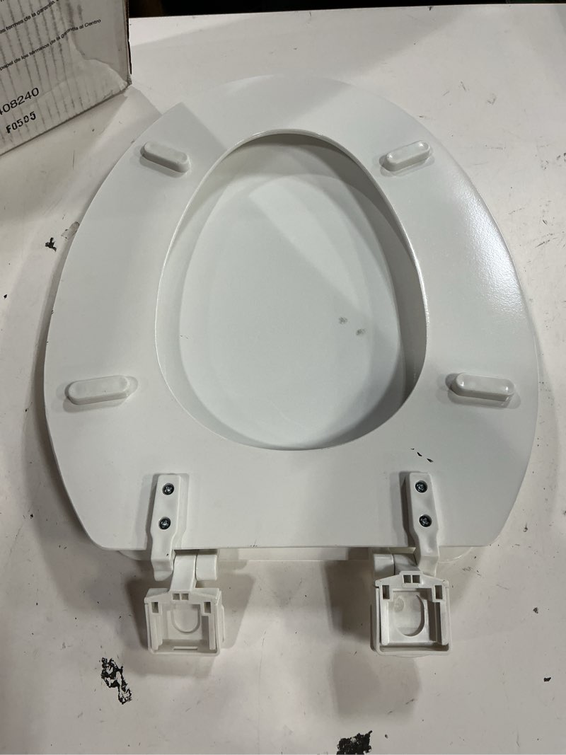 Condition photo showing As Is for kohler 20110-0 brevia, slow close toilet seat, elongated toilet seat, grip-tight bumpers quick-attach hardware, white white elongated quiet-close