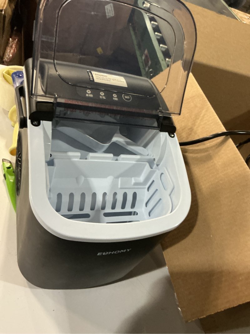 Condition photo showing As Is for euhomy countertop ice maker machine with handle, 26lbs in 24hrs, 9 ice cubes ready in 6 mins, auto-cleaning portable ice maker with basket and scoop, for home/kitchen/camping/rv. (black) black 26lbs