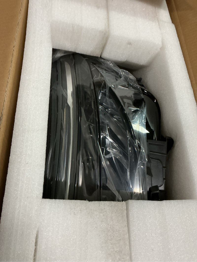 Condition photo showing New/Like New for Driver’s side headlight set compatible with Equinox LT | RS 2022- 2024 headlight with DRL GM2502532 (left)