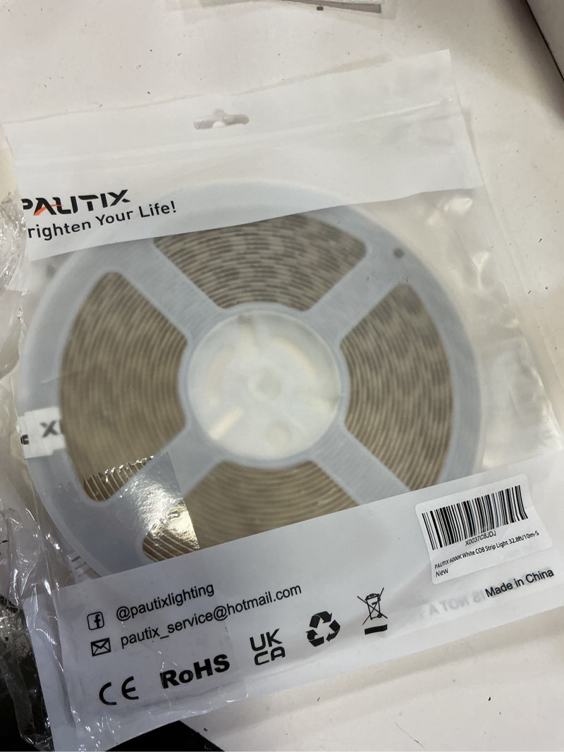 Condition photo showing As Is for pautix cob led strip light 32.8ft/10m 5040leds white 6000k,high lumen flexible cri93+ led tape super bright dc24v,for cabinet home diy lighting projects,5-year warranty(power supply not included)