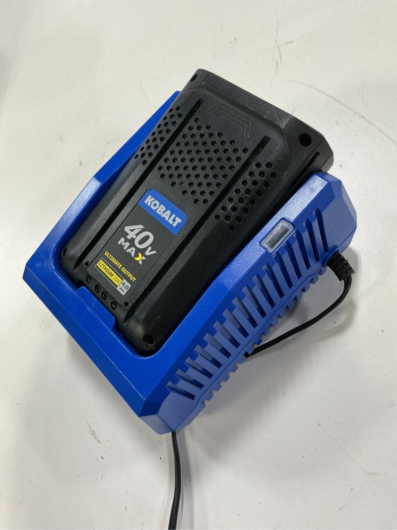 Condition photo showing As Is for kobalt 40 -volt, battery charger