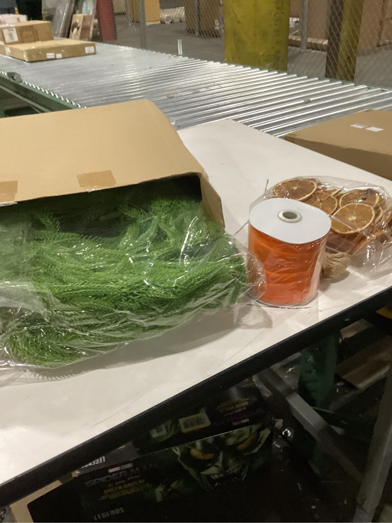 Condition photo showing New/Like New for 16 ft Christmas Artificial Norfolk Garland Real Touch Norfolk Pine Staircase Garland with 50 Pcs Dried Orange Slice 99 ft Velvet Ribbon Realistic Decor for Indoor Outdoor Xmas Stair Mantle Fireplace