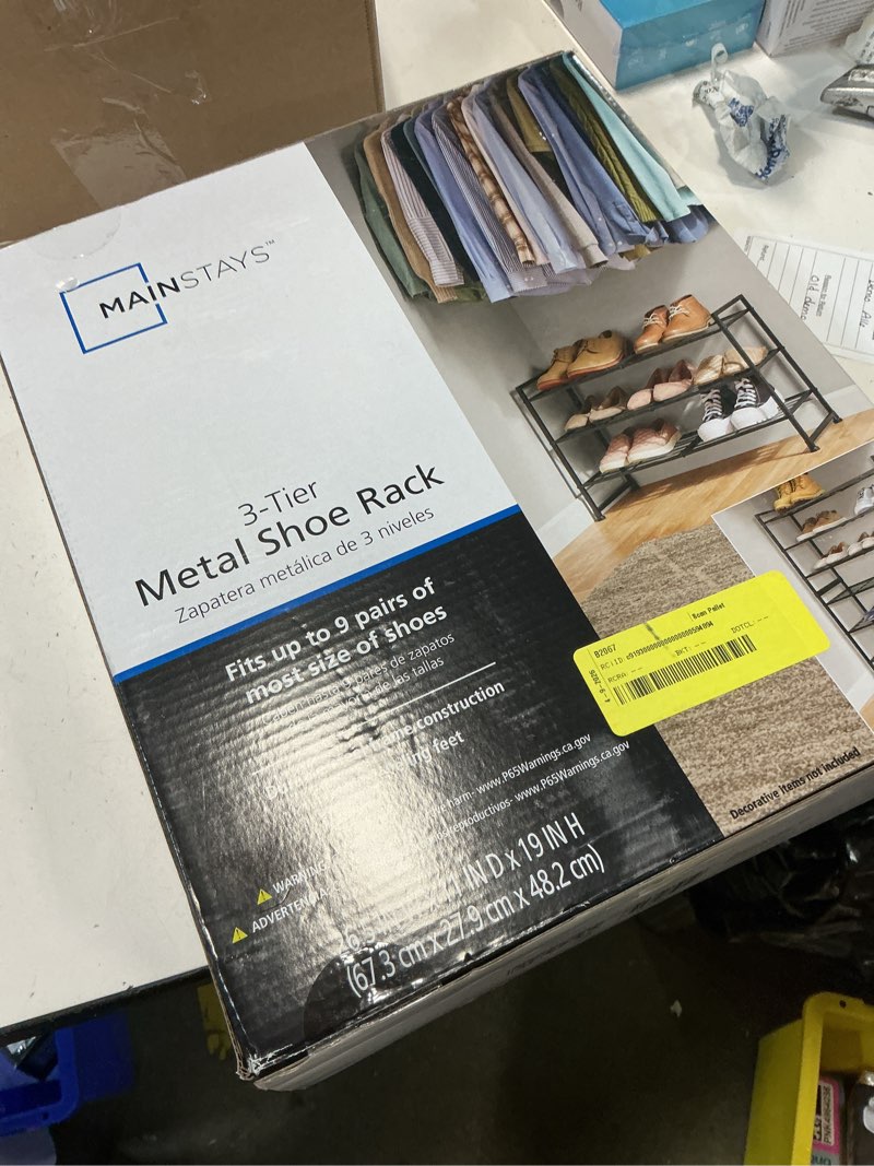 Condition photo showing New/Like New for mainstays 3 tier metal shoe rack