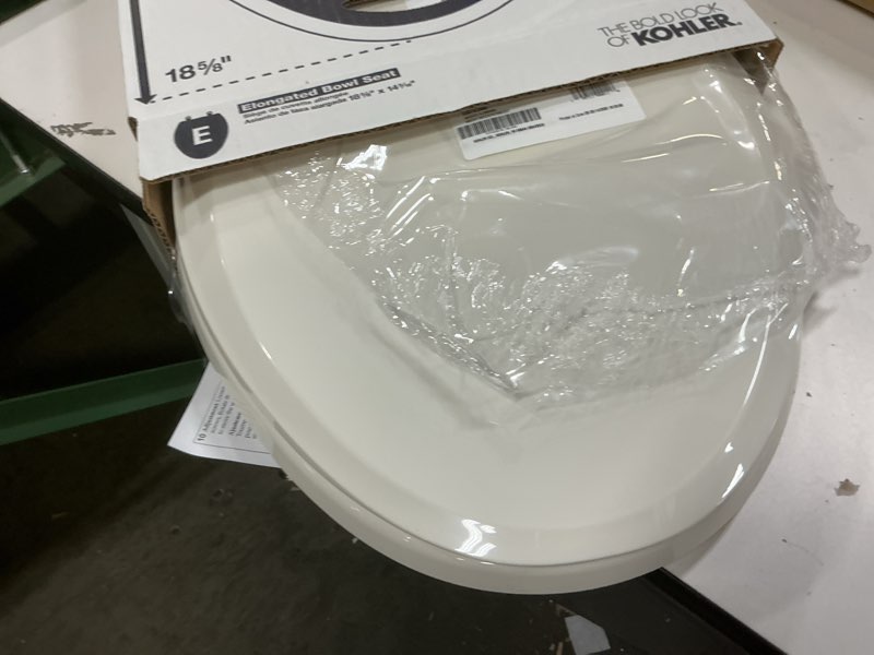 Condition photo showing Good Condition for kohler 4636-rl-96 cachet readylatch elongated toilet seat slow close soft close, toilet seat quiet lid, contoured grip-tight bumpers installation hardware, apartment essentials, biscuit biscuit elongated ready latch
