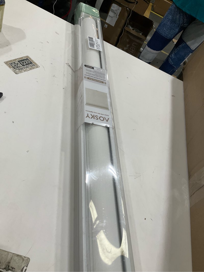 Condition photo showing As Is for AOSKY Light Filtering Roller Shades Cordless Blinds for Windows, Free-Stop Shades with Valance, 99% Blackout, Thermal Insulated Fabric, UV Protection, Natural Woven Blinds?35" W x 72" H, White? White 35"W x 72"H