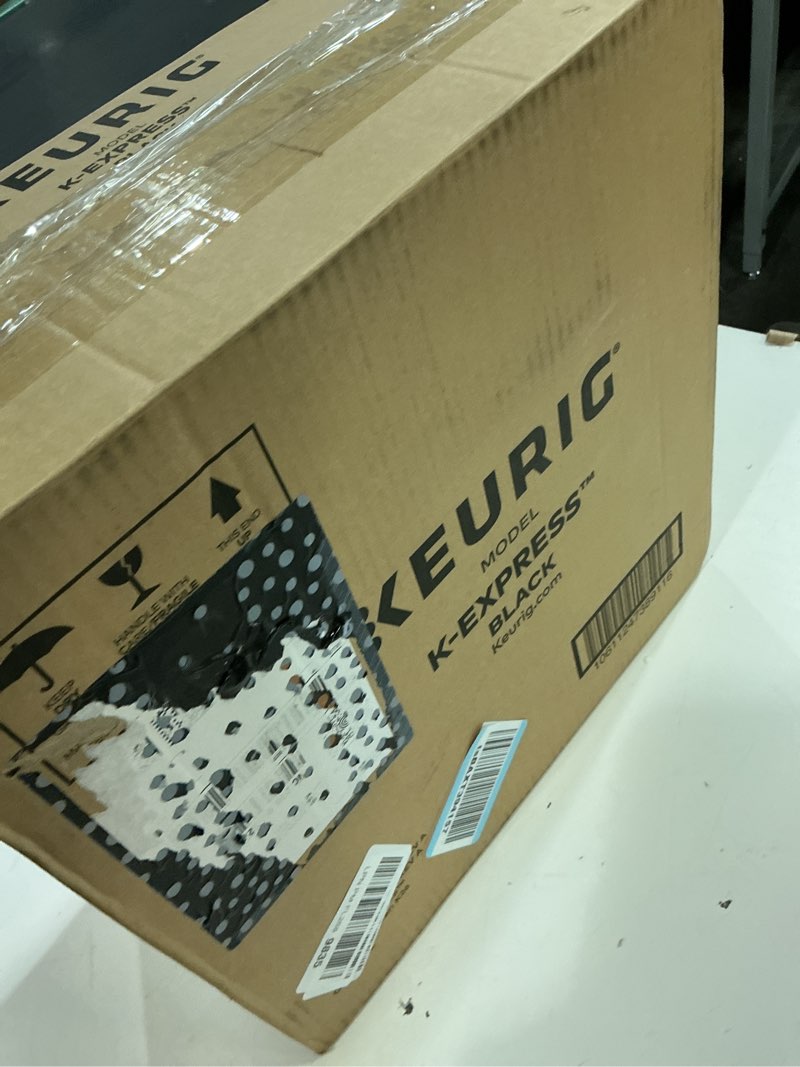 Condition photo showing As Is for keurig k-express single serve k-cup pod coffee maker, 3 brew sizes, strong button feature, 42oz removable reservoir, black