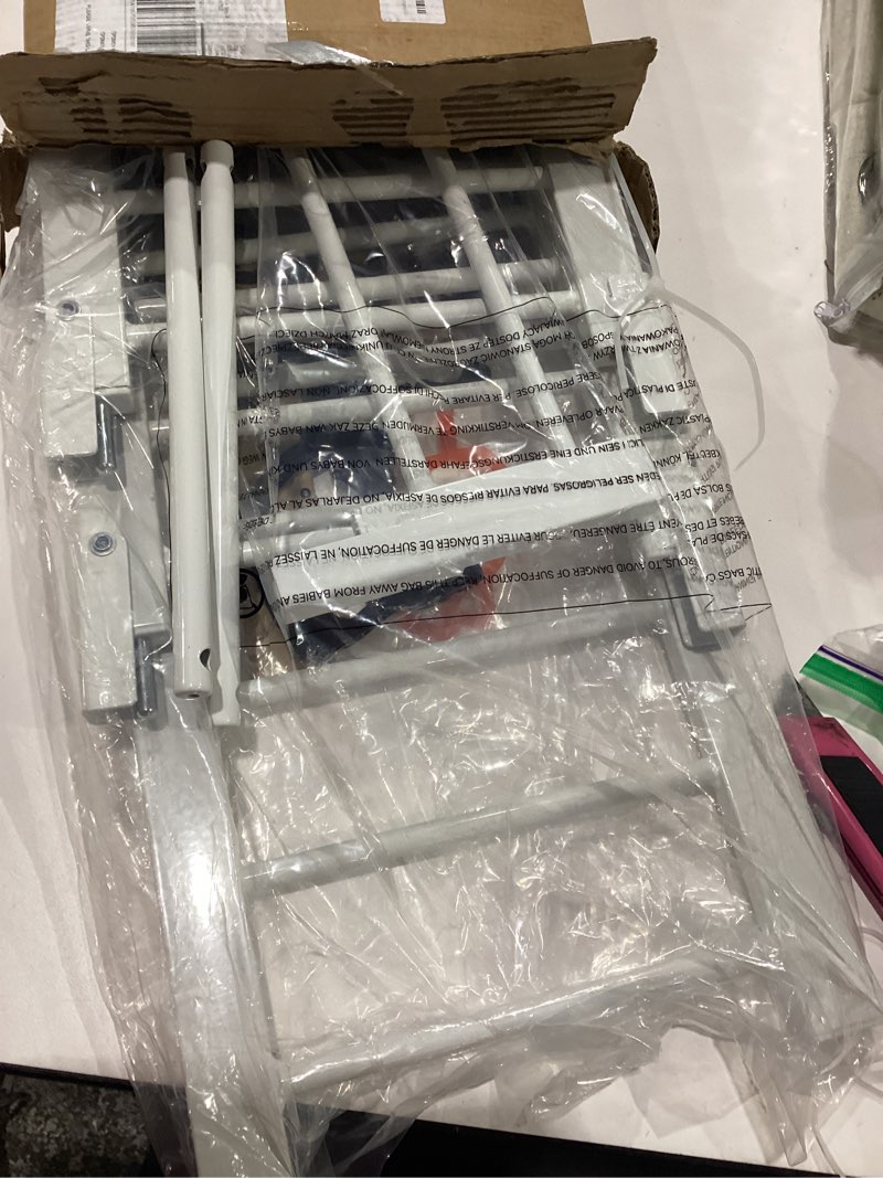 Condition photo showing Good Condition for fldofaves dog gate - 18"-45" adjustable extra wide metal baby gate to step over, 10" tall small pet gate with 3 extension kits, pressure mounted for doorways & stairs 18-45''w*10''h white