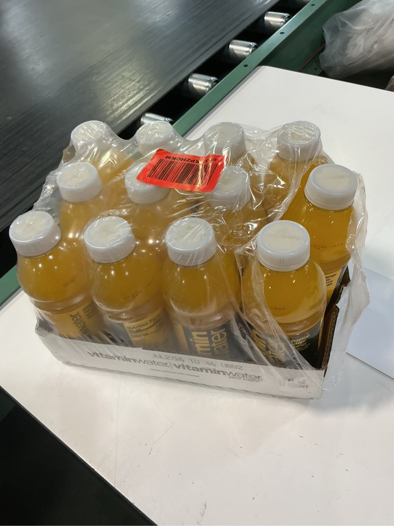 Condition photo showing Good Condition for (jul / 2027 ) vitaminwater energy tropical citrus nutrient enhanced flavored water beverage, 20 fl oz bottles, 12 pack energy tropical citrus 20 fl oz (pack of 12)