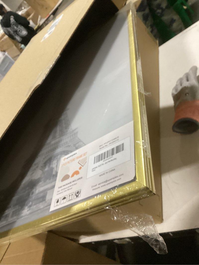 Condition photo showing Good Condition for upsimples 16x20 picture frame gold 3 pack, scratch-proof poster frames 16 x 20 for photo gallery - slide-in strips, horizontal or vertical wall mounting gold 16x20