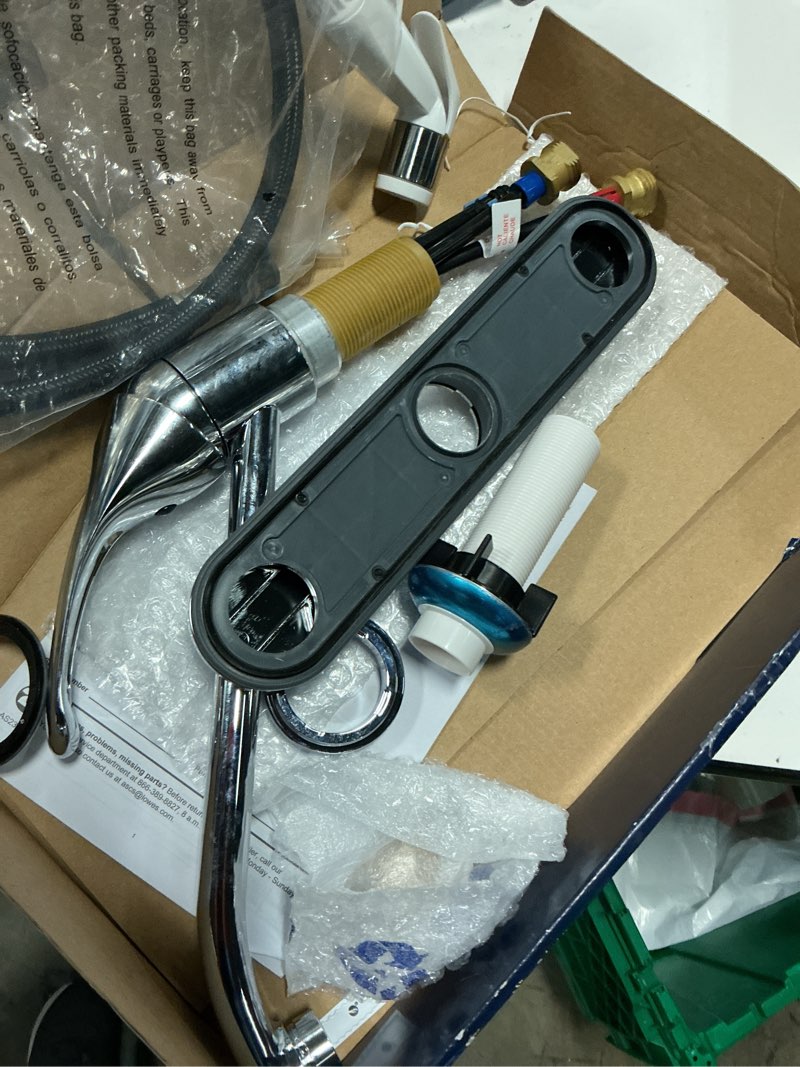 Condition photo showing As Is for project source wakebridge polished chrome single handle kitchen faucet (deck plate and side spray included)