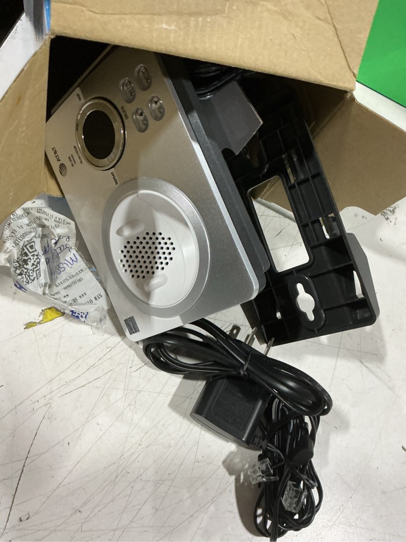 Condition photo showing As Is for at&t el52319 expandable cordless phone with unsurpassed range, answering system and caller id, 3 handsets, white/silver