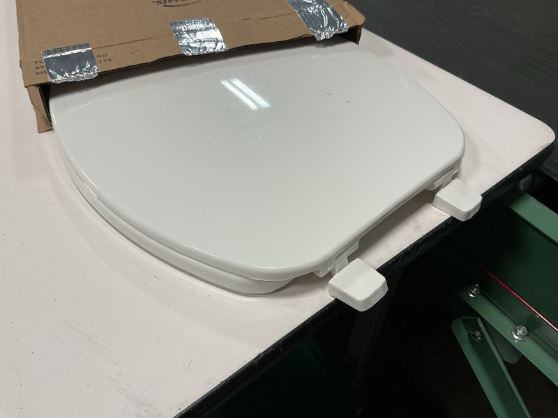 Condition photo showing As Is for bemis round enameled wood toilet seat in cotton white with easy•clean hinge