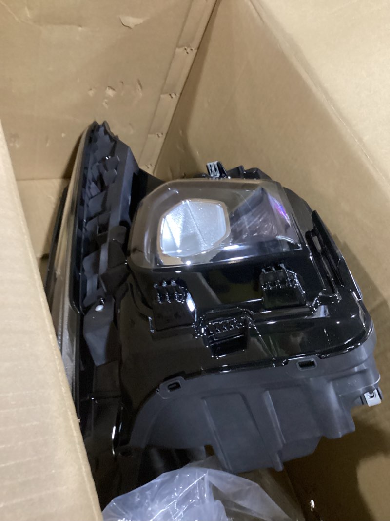 Condition photo showing Good Condition for similar replacement headlight assembly black housing clear lens