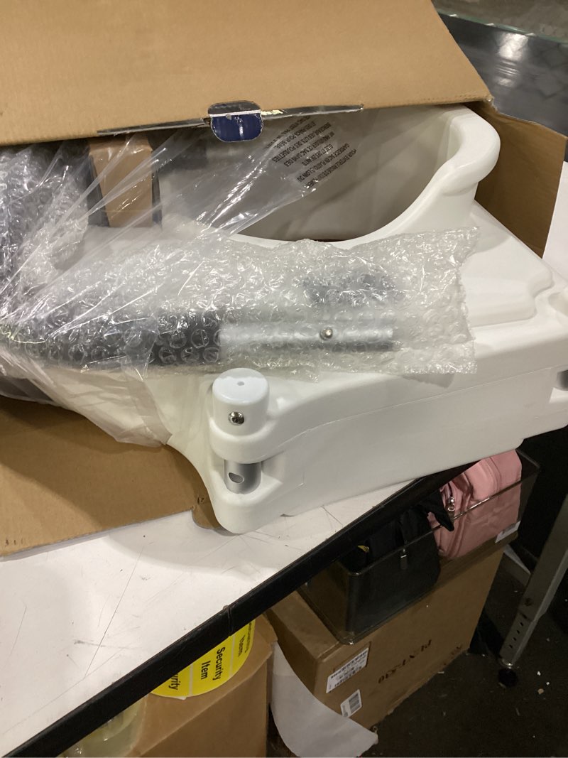 Condition photo showing As Is for bath safetyraised toilet seat product description: elev.toilet seat w/ remarms,rtl,1 ea