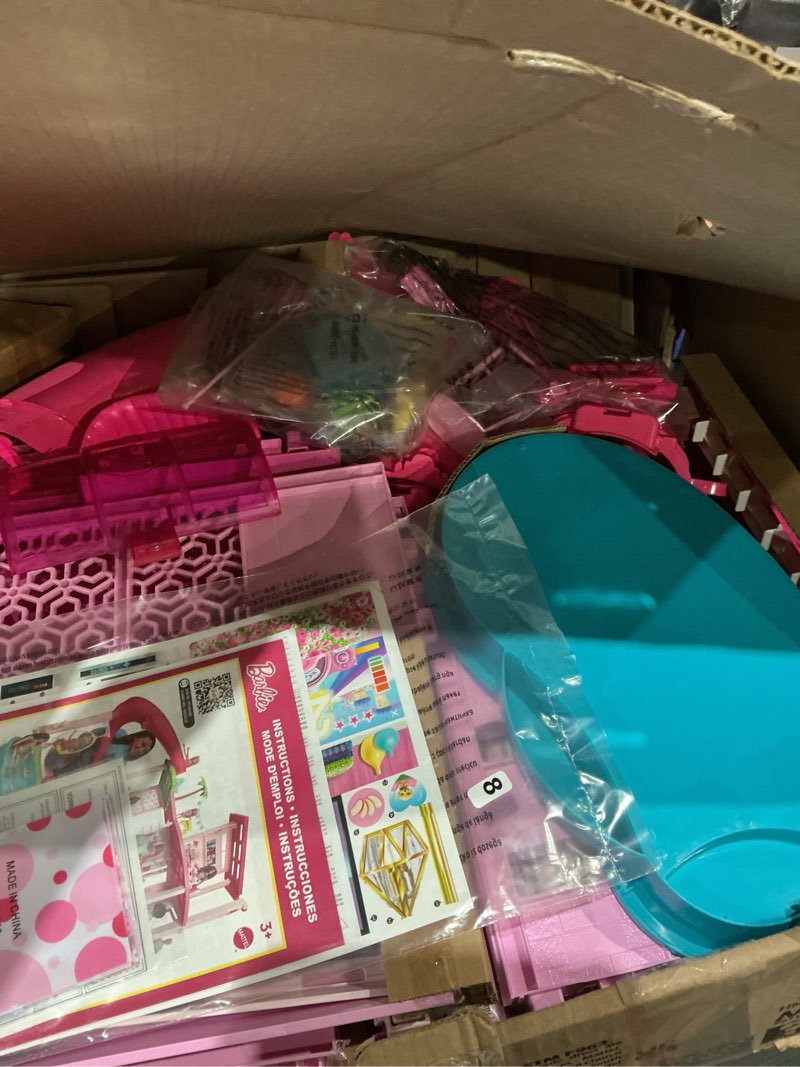 Condition photo showing As Is for barbie dreamhouse, pool party doll house with 75+ pieces and 3-story slide, house playset, pet elevator and puppy play areas