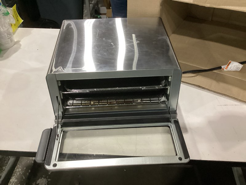 Condition photo showing Good Condition for ninja air fryer toaster oven combo | 8-in-1 functionality | flip up & away for storage space | air fry basket, sheet pan, wire rack & removable crumb tray |1800 watt | stainless steel | sp151 stainless premium 8-in-1 flip oven