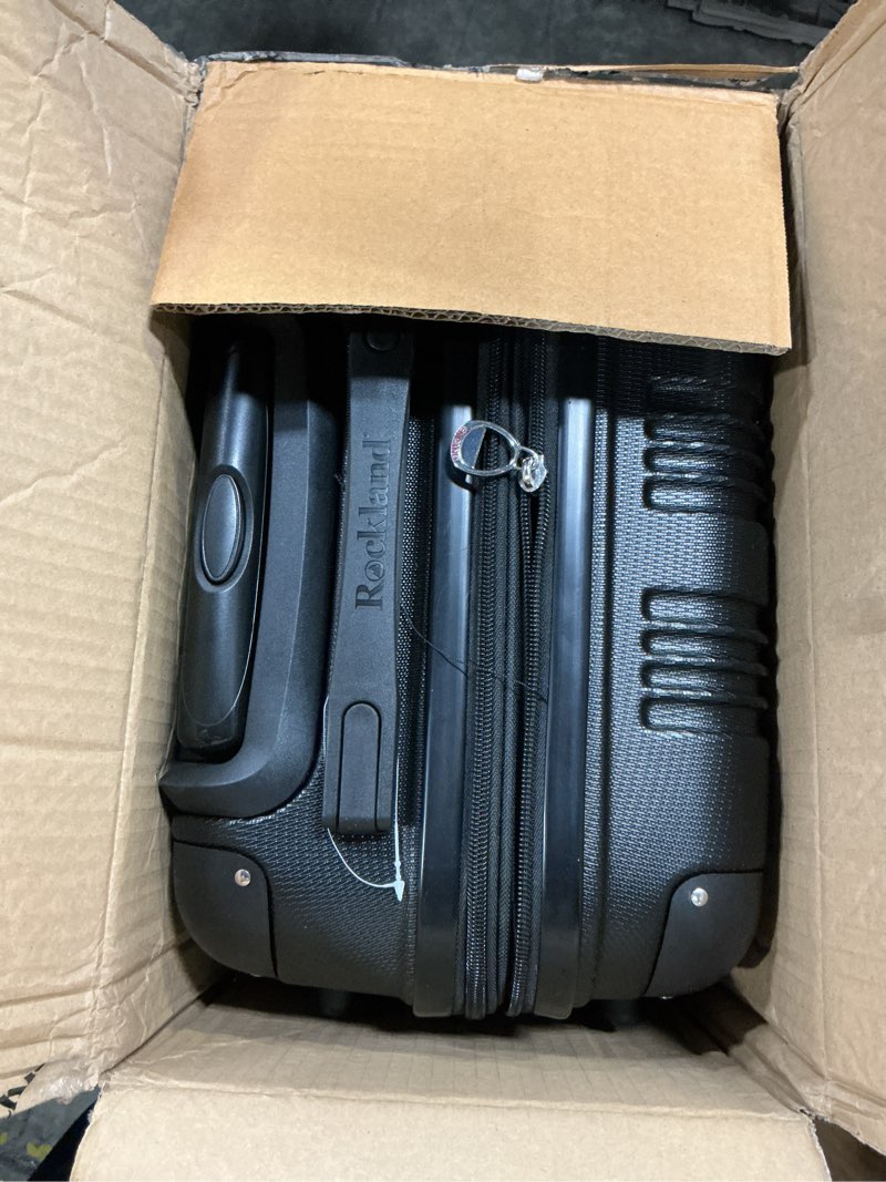Condition photo showing Good Condition for rockland london hardside spinner wheel luggage, black, carry-on 20-inch black carry-on 20-inch