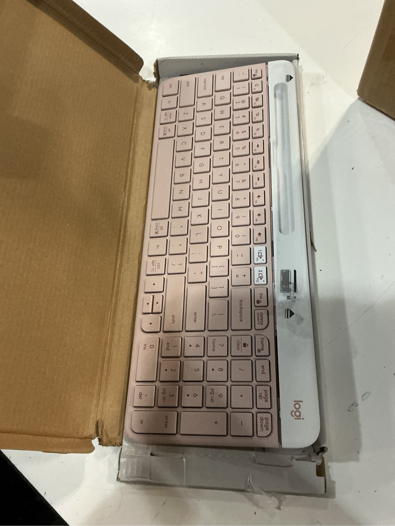 Condition photo showing As Is for logitech k585 multi-device slim wireless keyboard, built-in cradle for device; for laptop, tablet, desktop, smartphone, win/mac, bluetooth/receiver, compact, easy switch, 24 month battery - rose