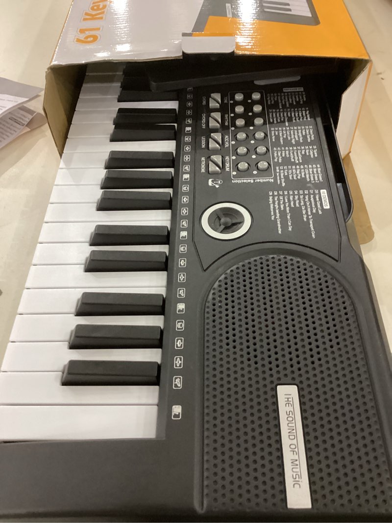 Condition photo showing Good Condition for 61 keys keyboard piano, Electronic Digital Piano with Built-In Speaker Microphone, Sheet Stand and Power Supply, Portable piano Keyboard Gift Teaching for Beginners Black