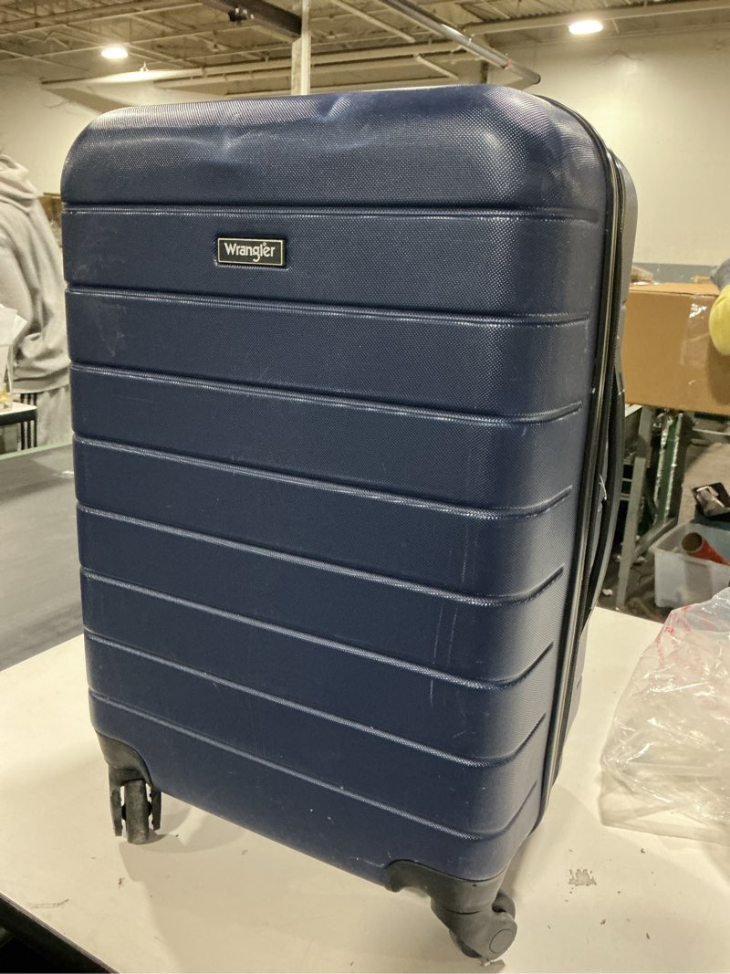 Condition photo showing As Is for Wrangler Smart Spinner Hardside Luggage, 22-Inch Carry-On, Navy Blue 22-Inch Carry-On Navy Blue