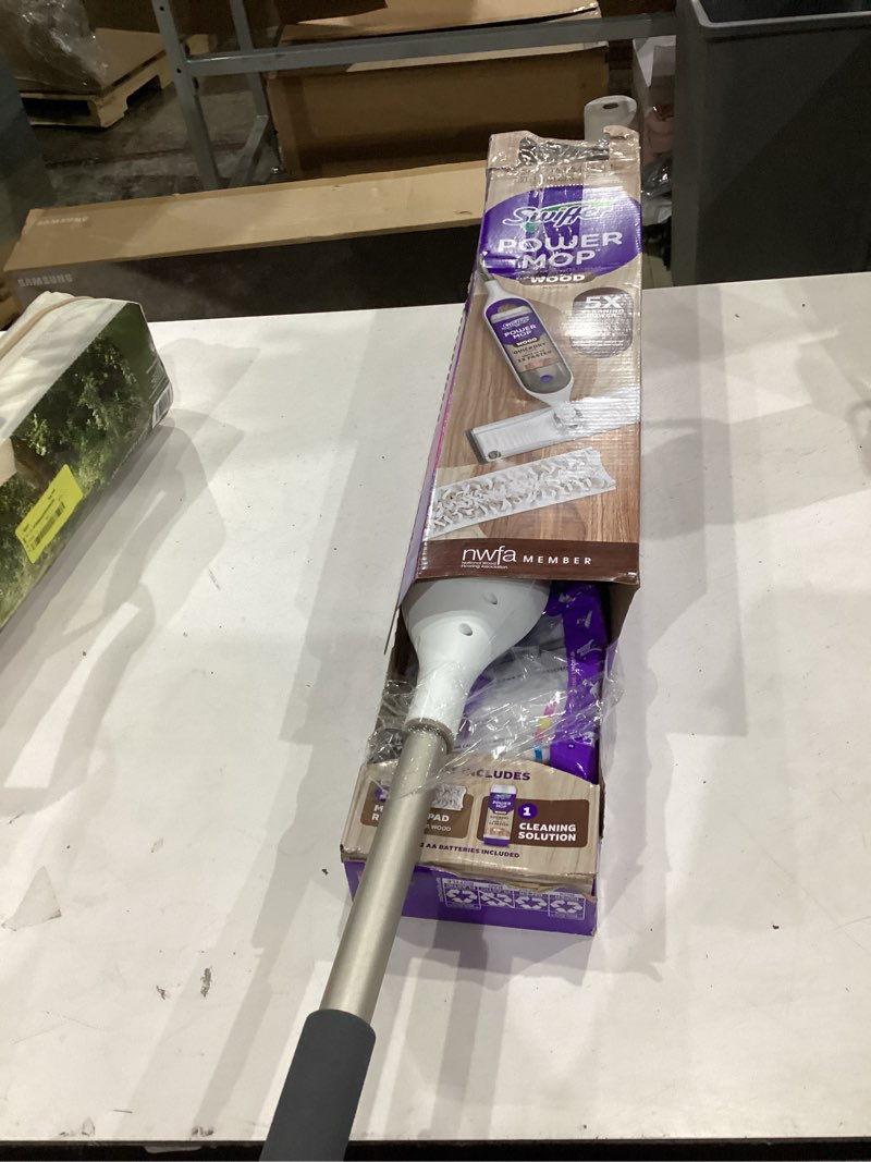 Condition photo showing As Is for power mop wood starter kit (1-power mop, 2-pads, cleaning solution and batteries)