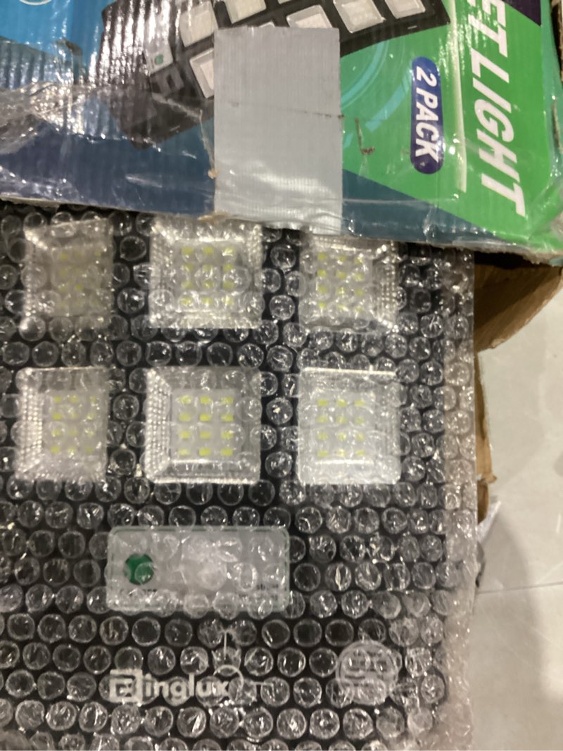 Condition photo showing Good Condition for Solar Street Lights Outdoor Waterproof, 60000LM Solar Lights Outdoor Dusk to Dawn with 9.3" Metal Light Bracket, 6500K Solar Flood Security Light Motion Sensor w 12000mAh Battery & 65FT Remote, 2 Pack 2 Pack 60000LM