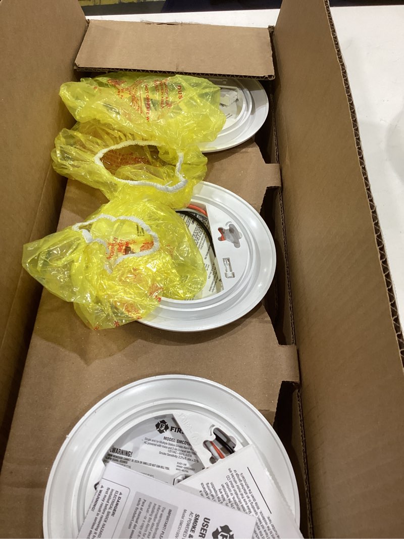 Condition photo showing As Is for First Alert Combination Smoke & Carbon Monoxide Alarm, Interconnect Hardwire Detector with Battery Backup and Voice & Location Alerts, SMCO100V-AC, 3-Pack 3-Pack Precision Detection