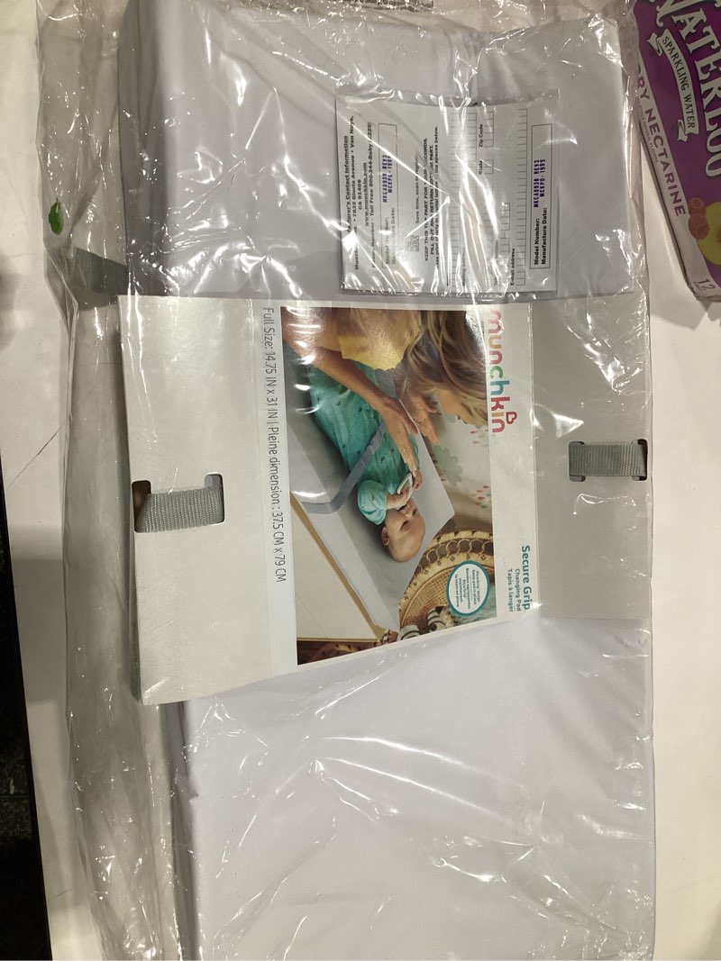 Condition photo showing New/Like New for Munchkin Secure Grip Baby Diaper Changing Pad with Cover for Dresser, Waterproof and Wipeable, Contoured, Standard Size (14.75" x 31"), White Changing Pad + Cover
