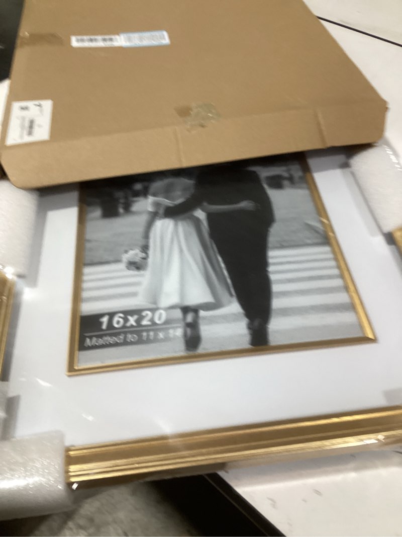 Condition photo showing New/Like New for Yaetm 16x20 Gold Picture Frame with Decorative Inner Frame & Tempered Glass, Display 11x14 Photos with Mat on Wall - Portrait or Landscape - Ideal for Office & Home Décor (Gold, Single) 16x20 - 1 pack Gold