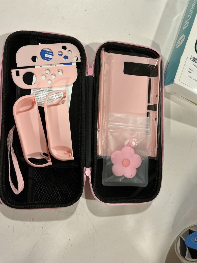 Condition photo showing Good Condition for dlseego pink switch case set carrying case with 10 slots cute protective dockable hard shell with 4pcs lovely cat paw thumb grips caps and 1pc flower blossom chain for switch 2017 version switch 1 6.3inch pink