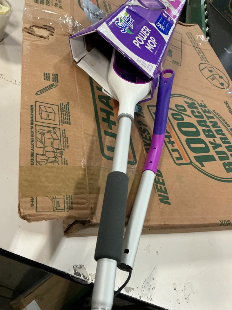 Condition photo showing As Is for Swiffer PowerMop Multi-Surface Mop Kit for Floor Cleaning, Includes PowerMop, 2 Mopping Pad Refills, 1 Cleaning Solution with Fresh Scent and 2 Batteries Purple and White