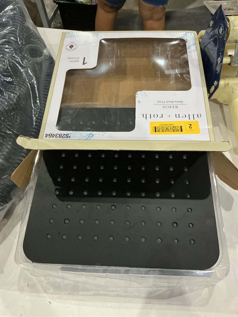 Condition photo showing As Is for allen + roth reign  matte black 10-in square fixed rain shower head 1.8 gpm