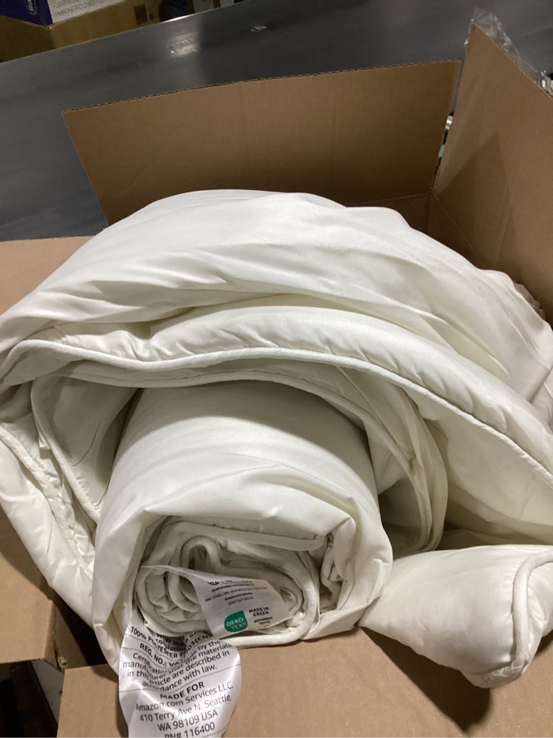Condition photo showing Good Condition for amazon basics white down alternative comforter and duvet insert with corner tabs, machine washable, full/queen, all-season full/queen all-season