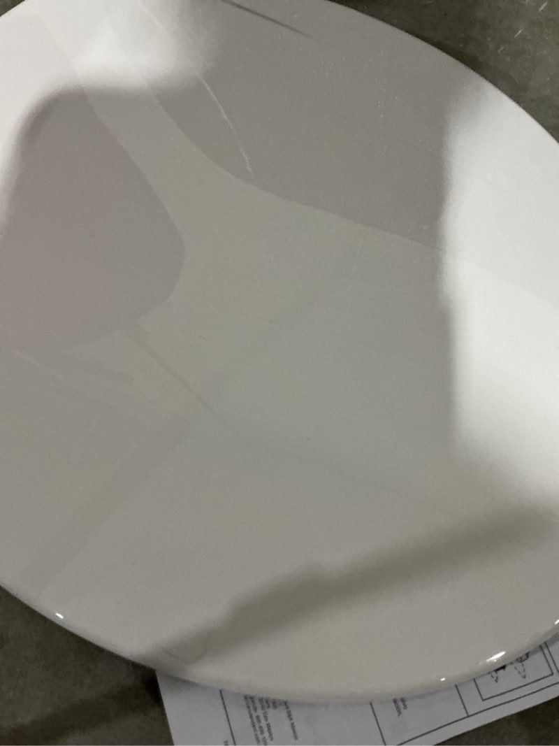 Condition photo showing Good Condition for american standard mightytuff plastic white round soft close toilet seat only