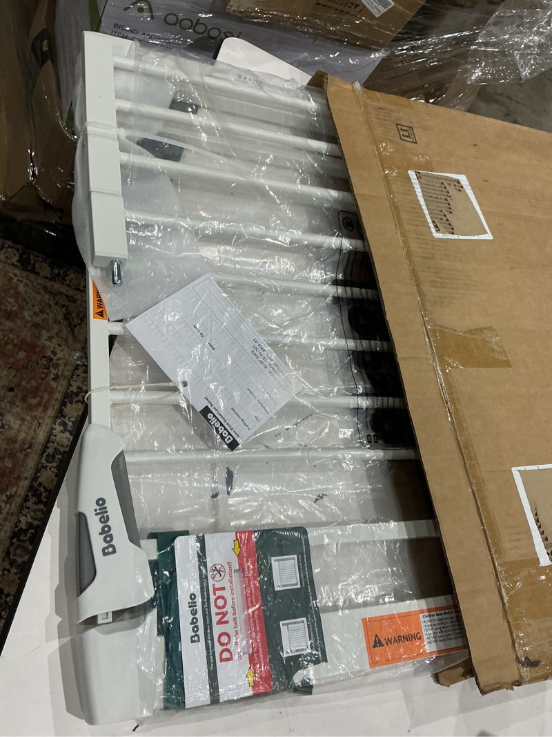 Condition photo showing Good Condition for babelio 36" tall upgraded baby gate with cat door, 29-43" auto close durable dog gate for stairs, doorways and house, easy walk thru safety gate with pet door includes 4 wall cups, white white 29-43" wide, 36" tall