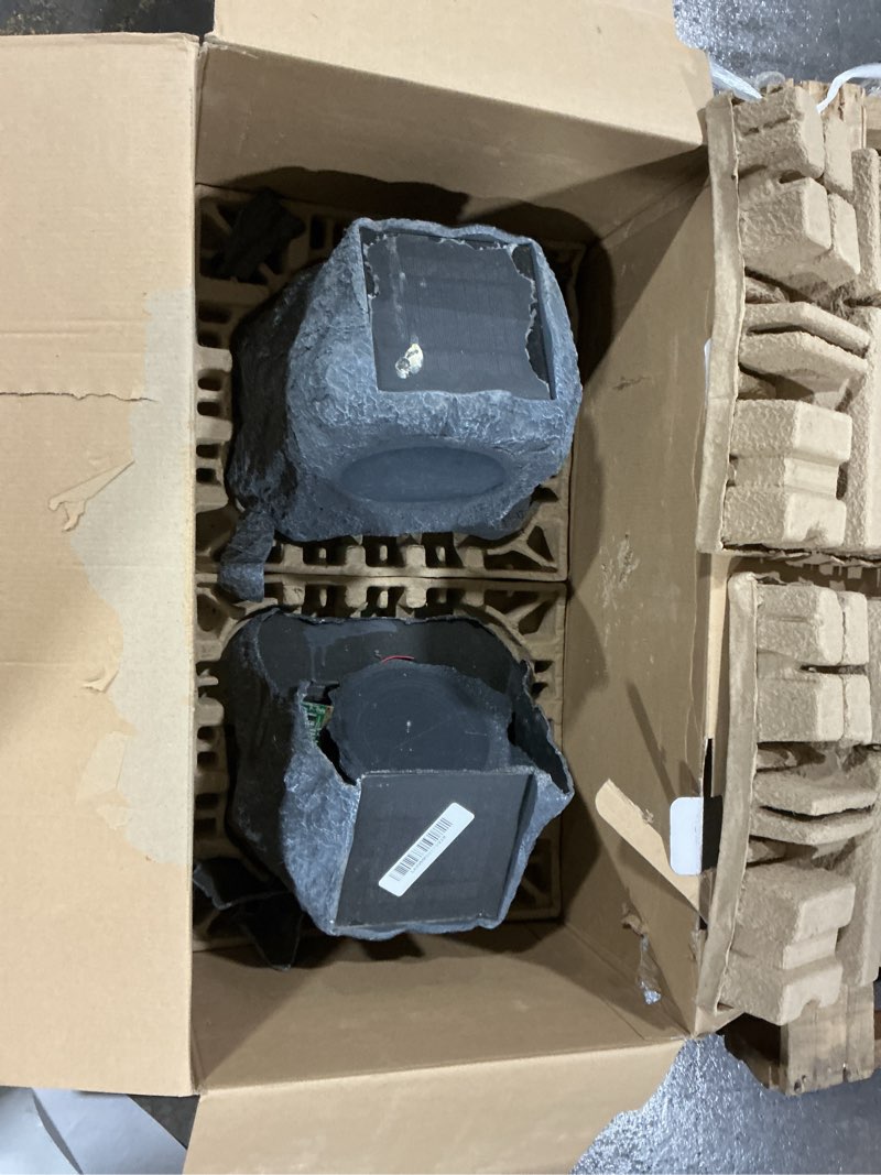 Condition photo showing As Is for it.innovative technology Outdoor Rock Speaker Pair - Wireless Bluetooth , for Garden, Patio, Waterproof, Built for all Seasons & Solar Powered with Rechargeable Battery, Music Streaming - Charcoal Solar Charcoal