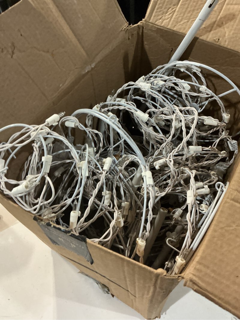 Condition photo showing As Is for Joiedomi 4 Pack 18" Spiral Christmas Tree Pathway Light, 100 Count Warm White Waterproof Pathway Yard Stake for Christmas, Garden, Lawn, Indoor Outdoor Holiday Decoration