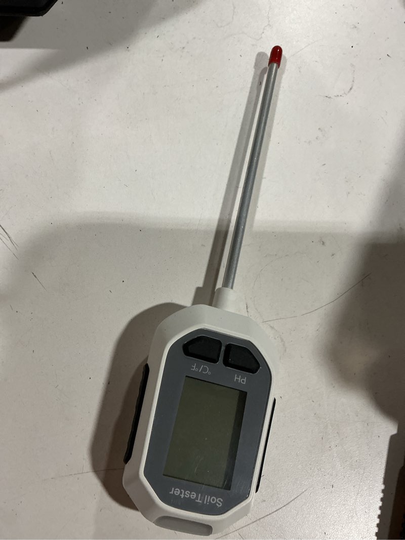 Condition photo showing As Is for yamron 4-in-1 soil moisture meter, digital plant temperature/soil moisture test & ph meter/sunlight intensity, backlight lcd display for gardening, farming and outdoor plants