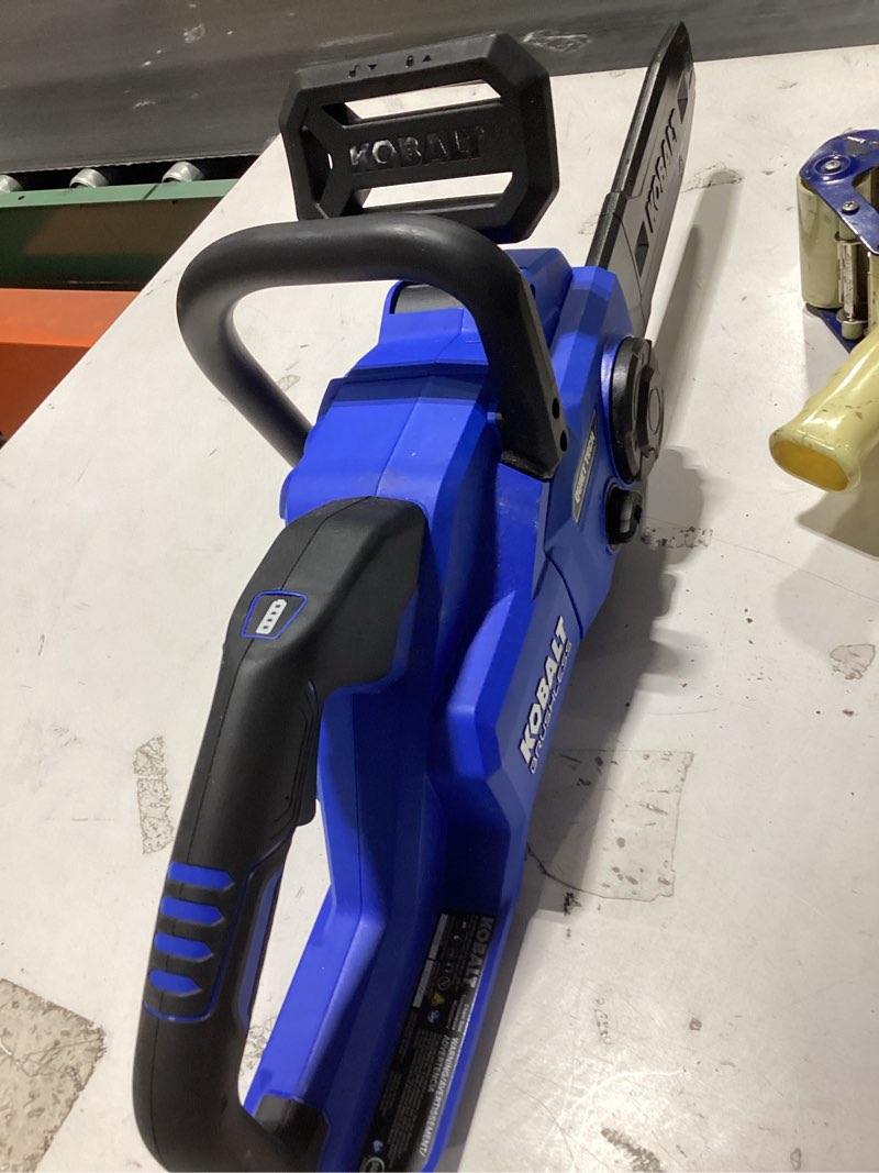 Condition photo showing As Is for kobalt quiet tech 24-volt 12-in battery chainsaw charger not included