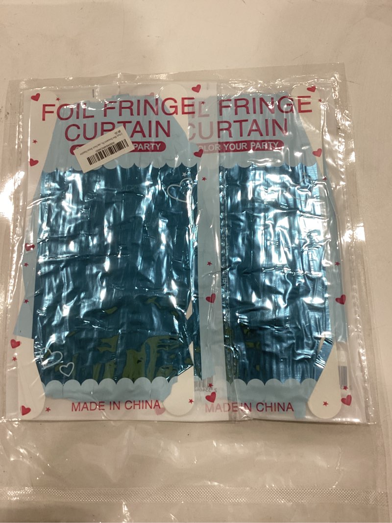 Condition photo showing As Is for foil fringe curtain