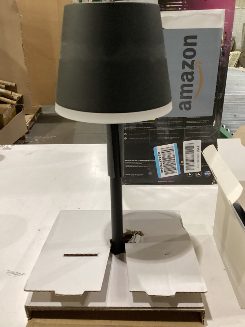 Condition photo showing New/Like New for Philips Hue Go Smart Portable Table Lamp, 1 Pack, Black, White and Color Ambiance LED Color-Changing Light, Smart LED Lamp for Indoor and Outdoor Use, Control with Hue App or Voice Assistant Black 1 Pack