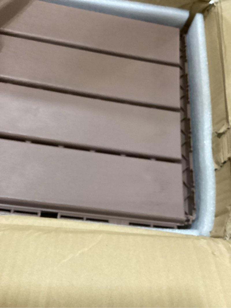 Condition photo showing Good Condition for IDZO Plastic Interlocking Deck Tiles - 9PCS Waterproof Outdoor Flooring, All Weather Use Patio Tiles, Decking Stripe Pattern, 12 x 12 x 0.7 Inches, Dark Brown Dark Brown Plastic
