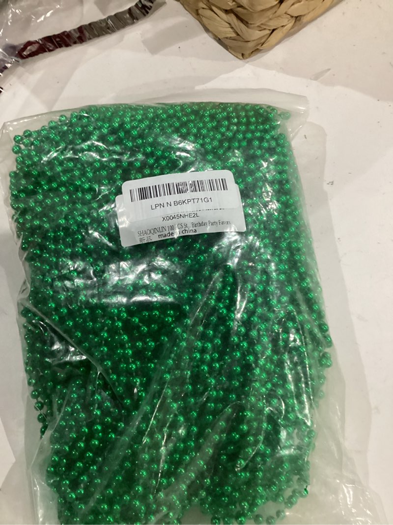 Condition photo showing Good Condition for SHAOQINLIN 100 PCS St. Patricks Day Beads Necklace, 33" Green Mardi Gras Beads Christmas Necklaces Irish Saint Patricks Necklaces for St. Patricks Day Mardi Gras Parade Throws Birthday Party Favors Green Round