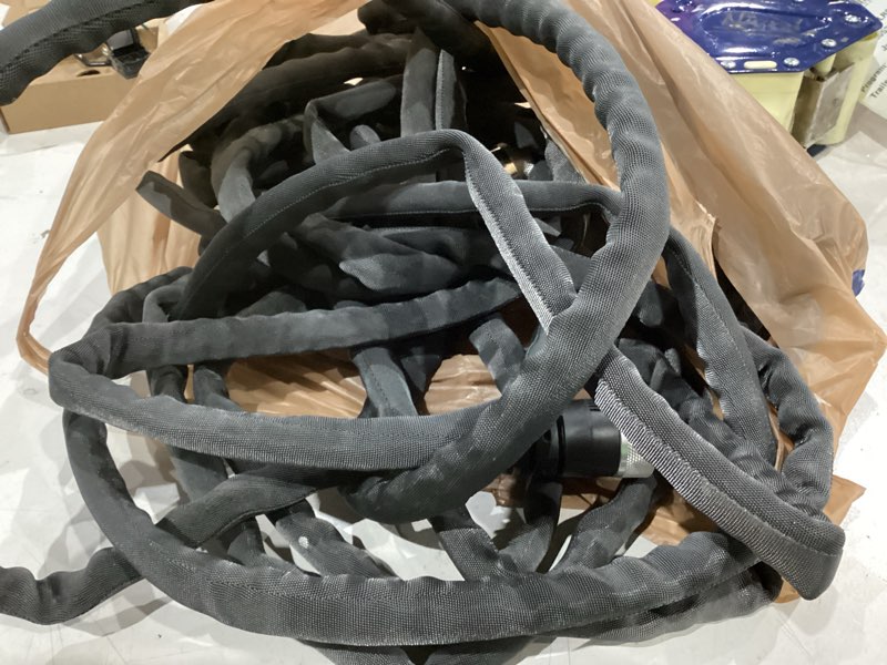 Condition photo showing As Is for zero-g teknor apex 5/8-in x 50-ft premium -duty kink free woven gray hose