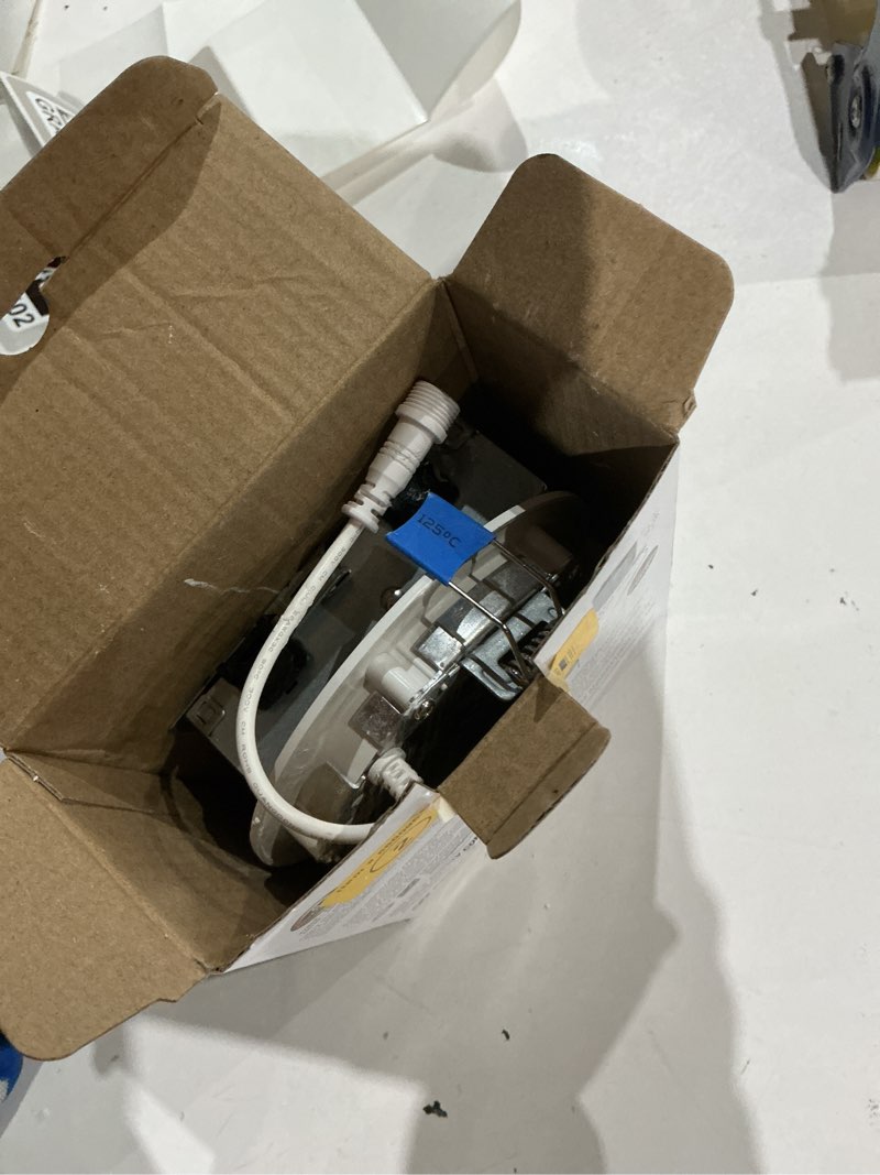 Condition photo showing As Is for halo white 4-in 725 -lumens switchable white round dimmable led canless wet rated recessed downlight